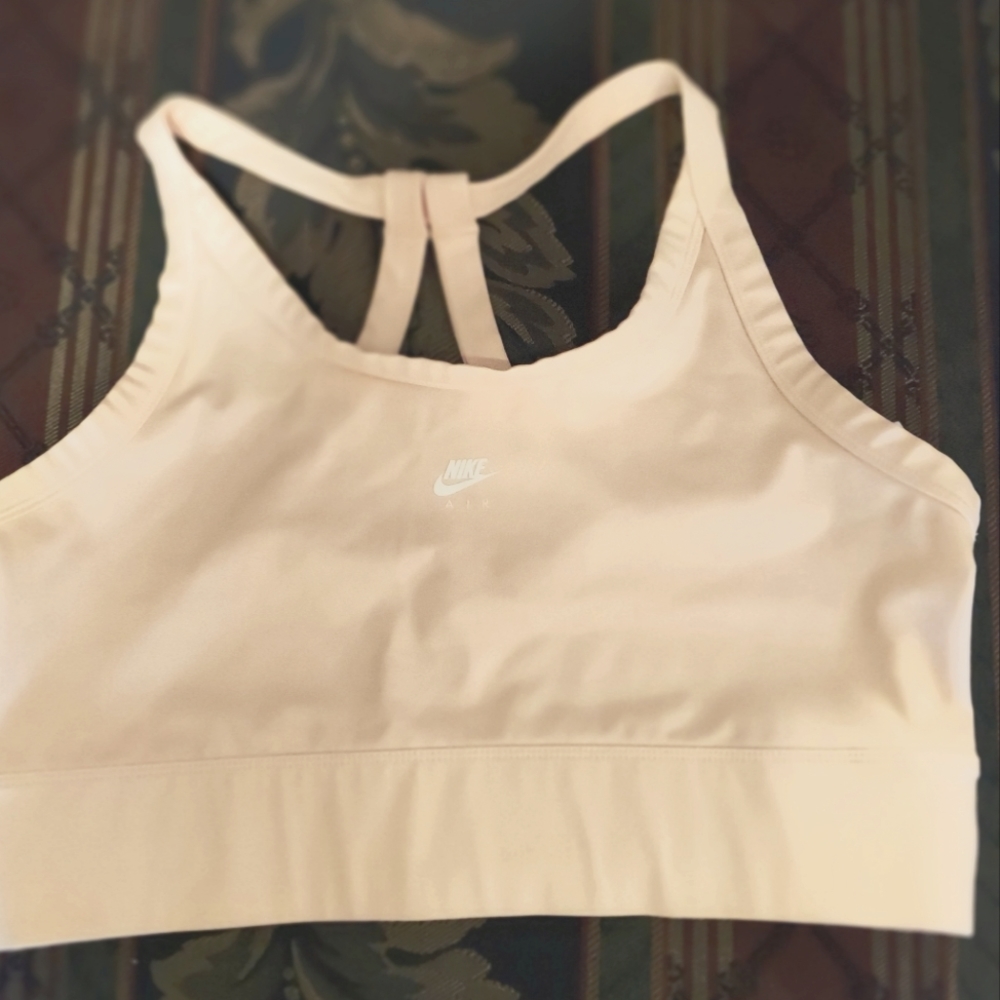 Nike, size Large ,pink sports bra.